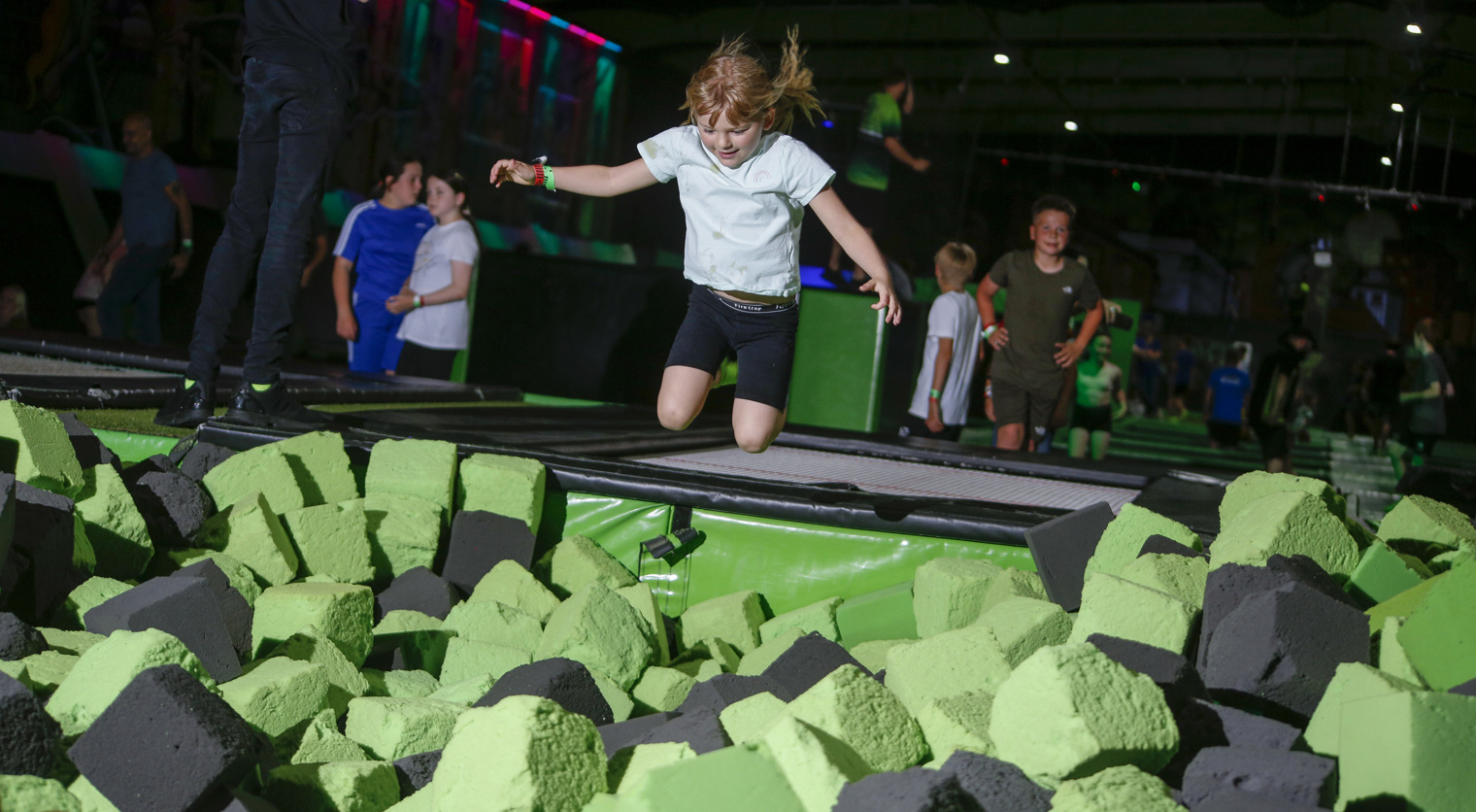 Girl jumping into Foam Pit at Flip Out UK