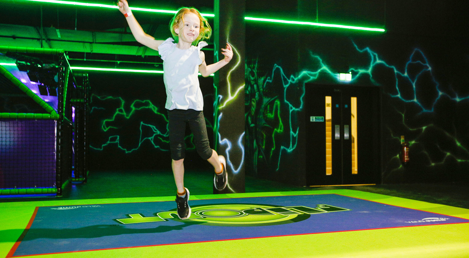A child interacting with their virtual player on the Valo Jump at Flip Out UK