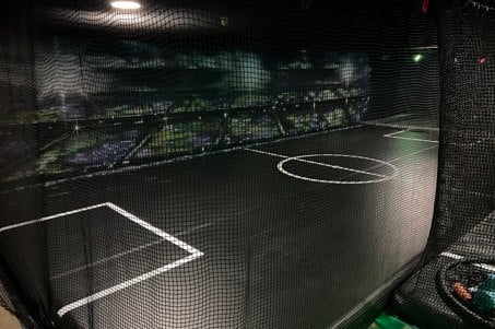 One of our sports zones - a football pitch with netting