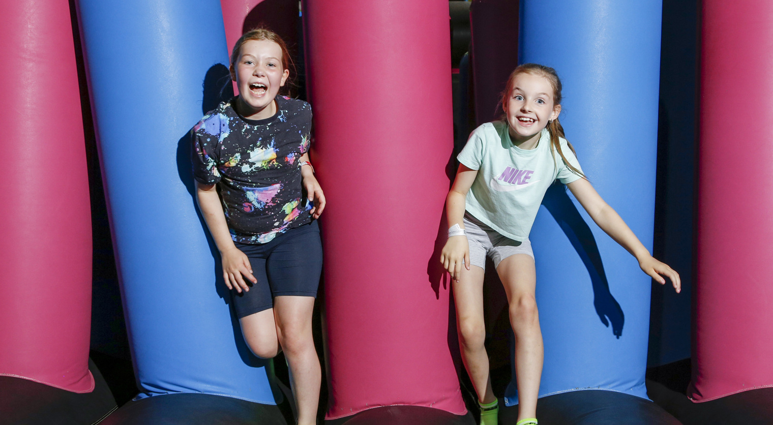 Children playing on a giant Inflatable at Flip Out UK