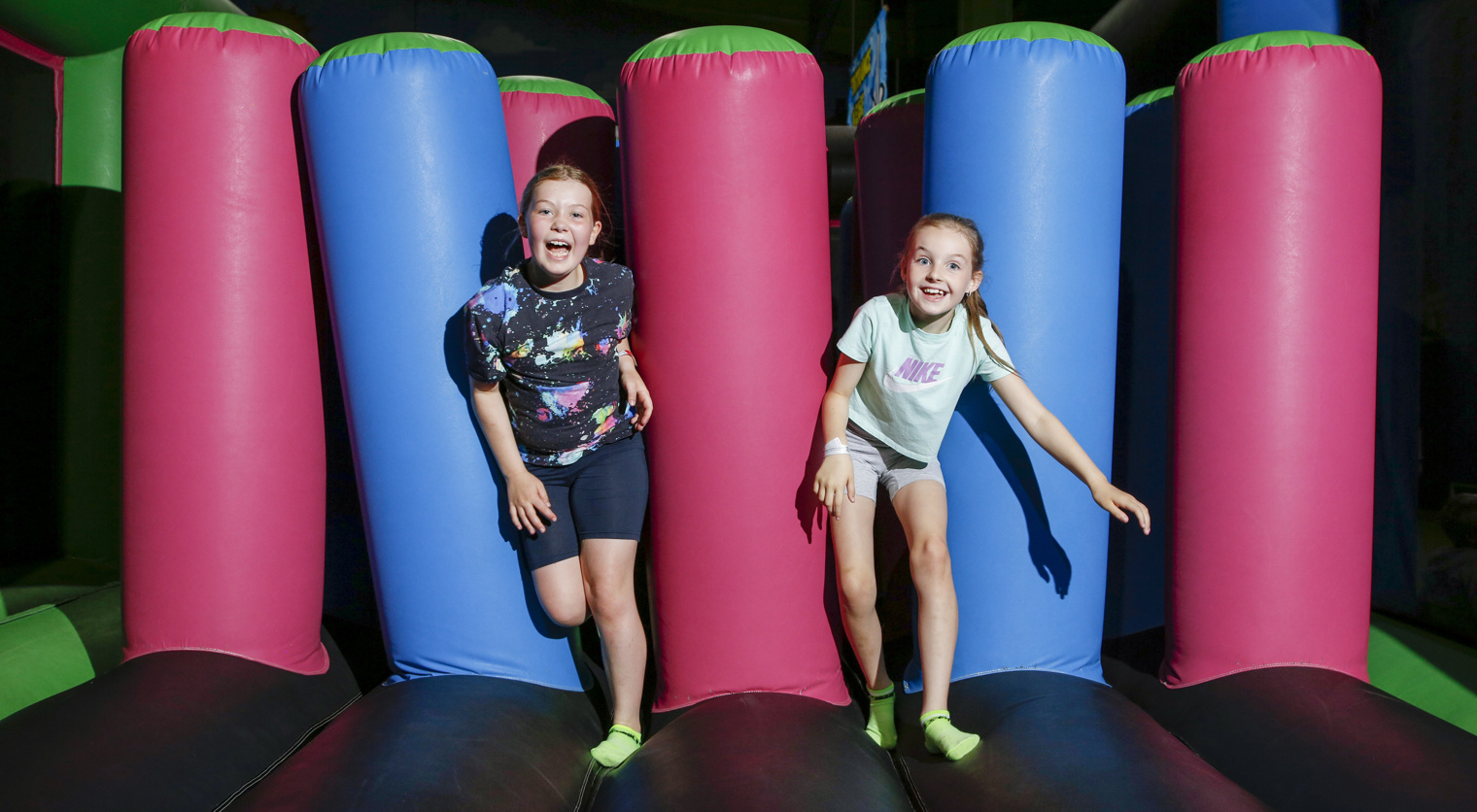 Children playing on a giant Inflatable at Flip Out UK